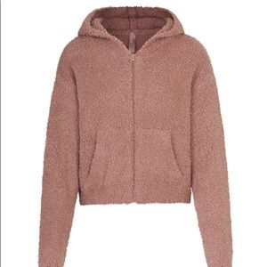 skims cozy knit zip up hoodie